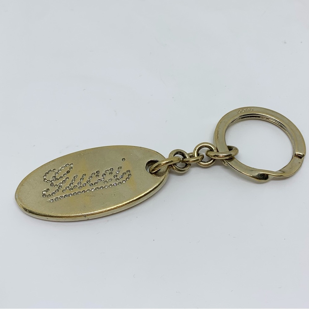 Gucci oval logo jeweled gold keychain!
